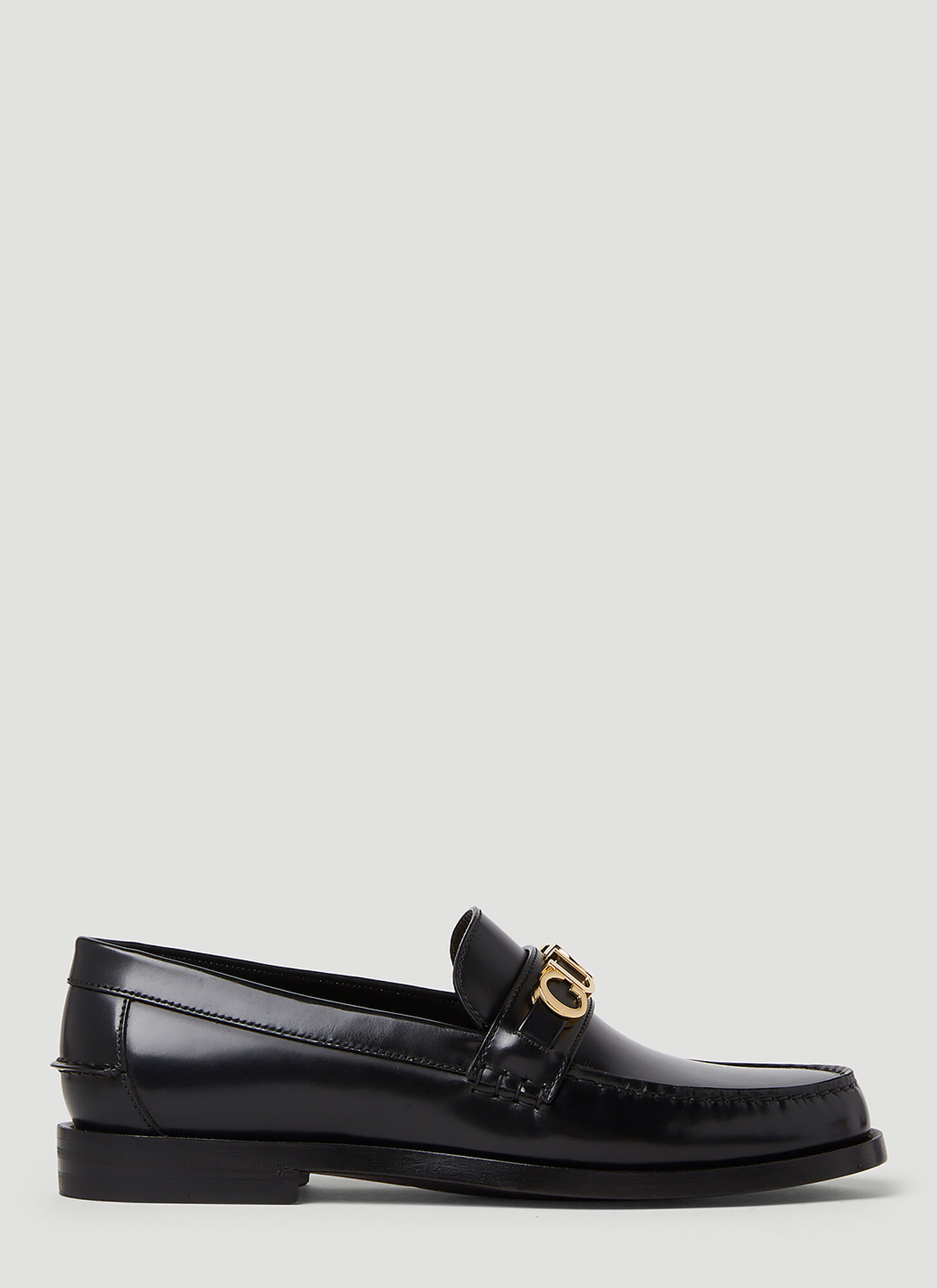 Shop Gucci Logo Plaque Loafers In Black