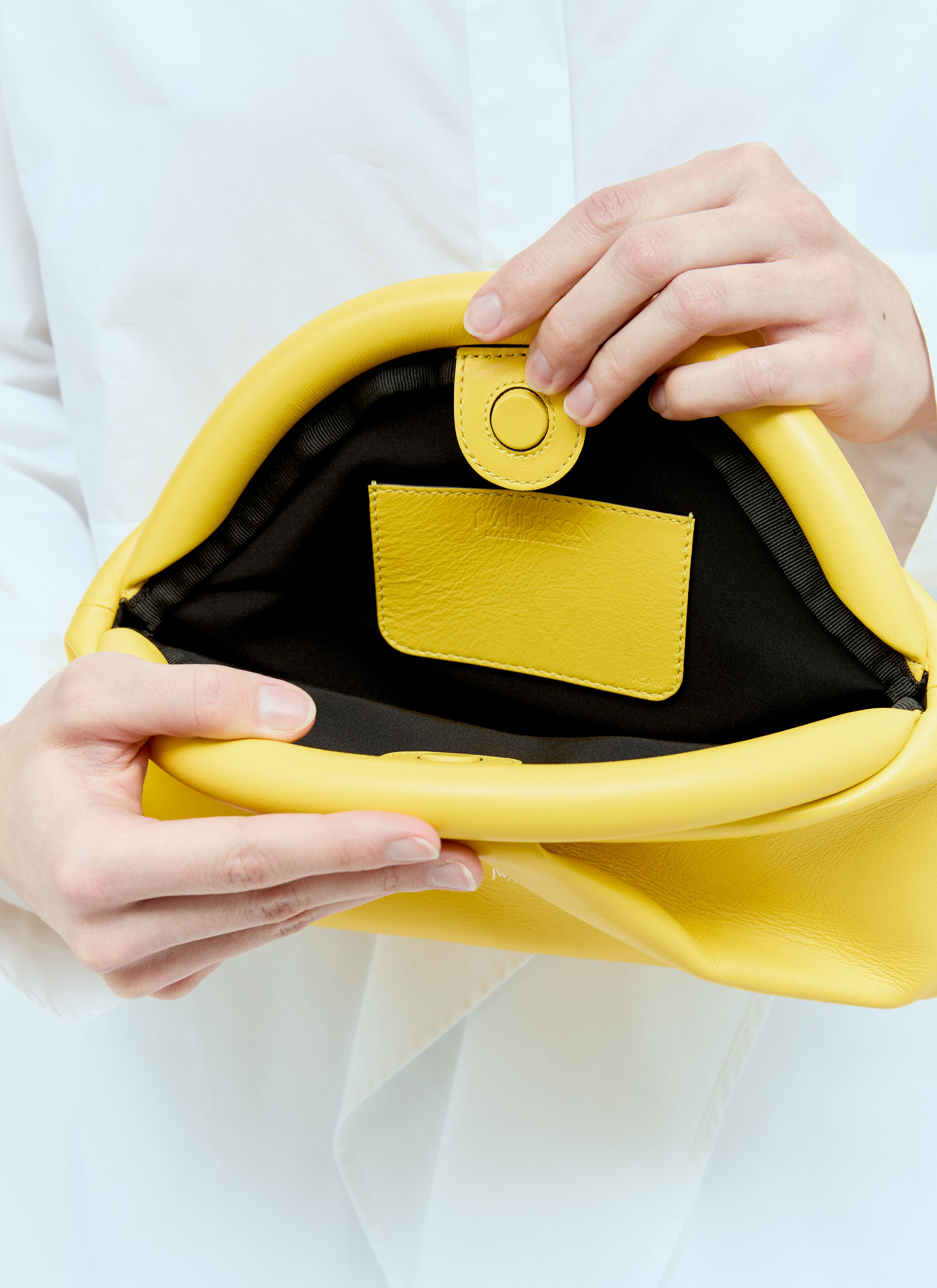 Pastel yellow clutch bag clearance
