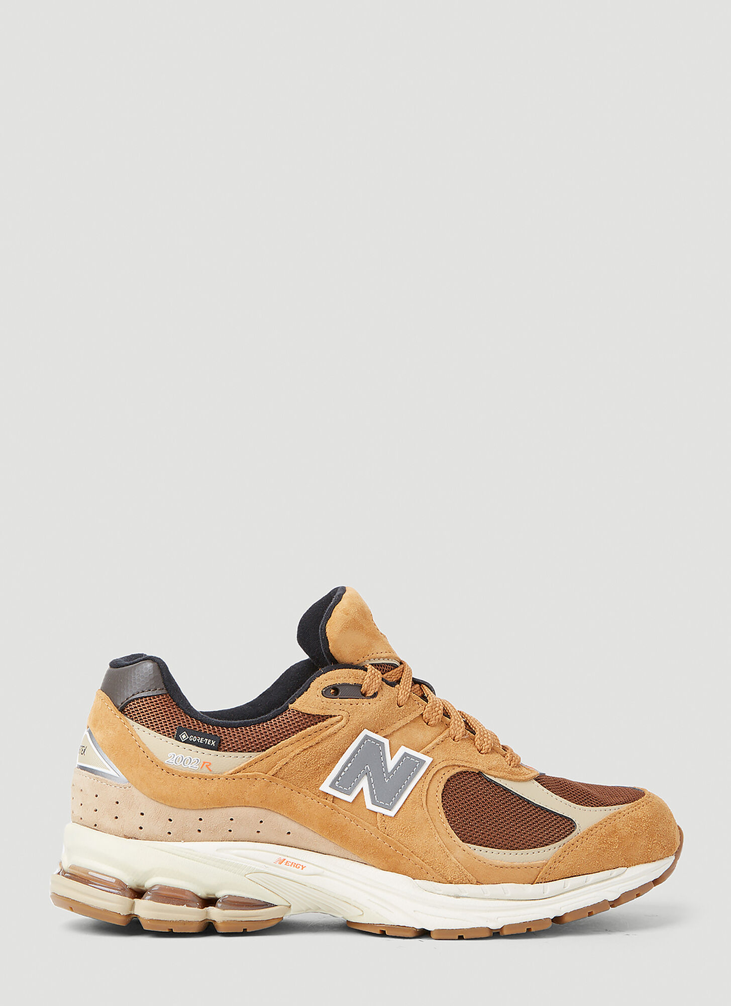 Shop New Balance 2002r Sneakers In Brown