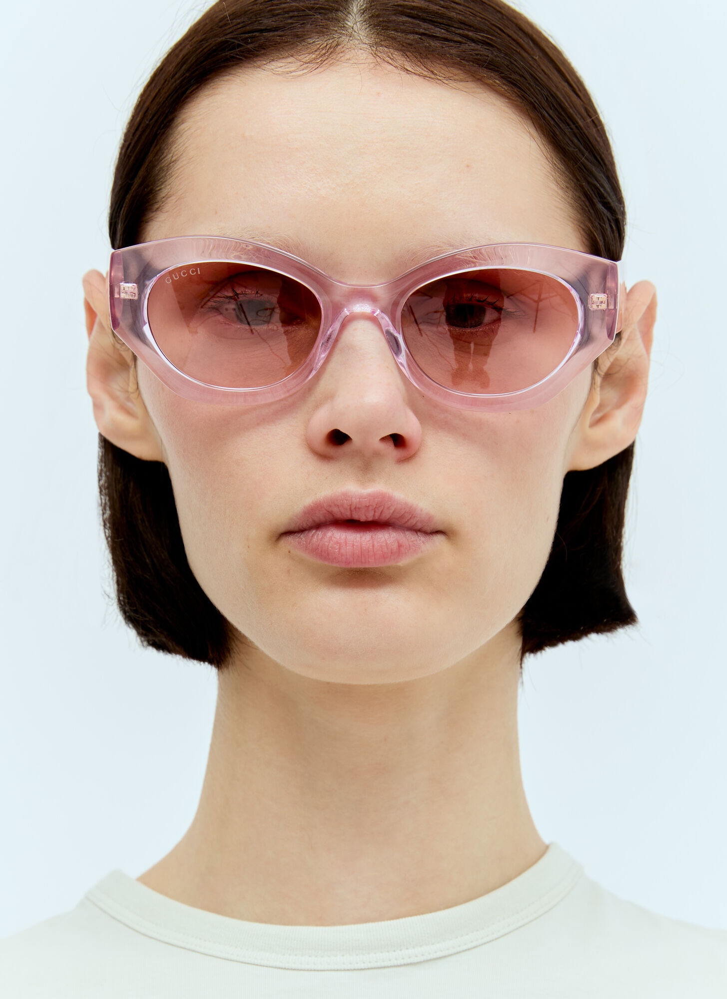 Shop Gucci Oval Frame Sunglasses In Pink