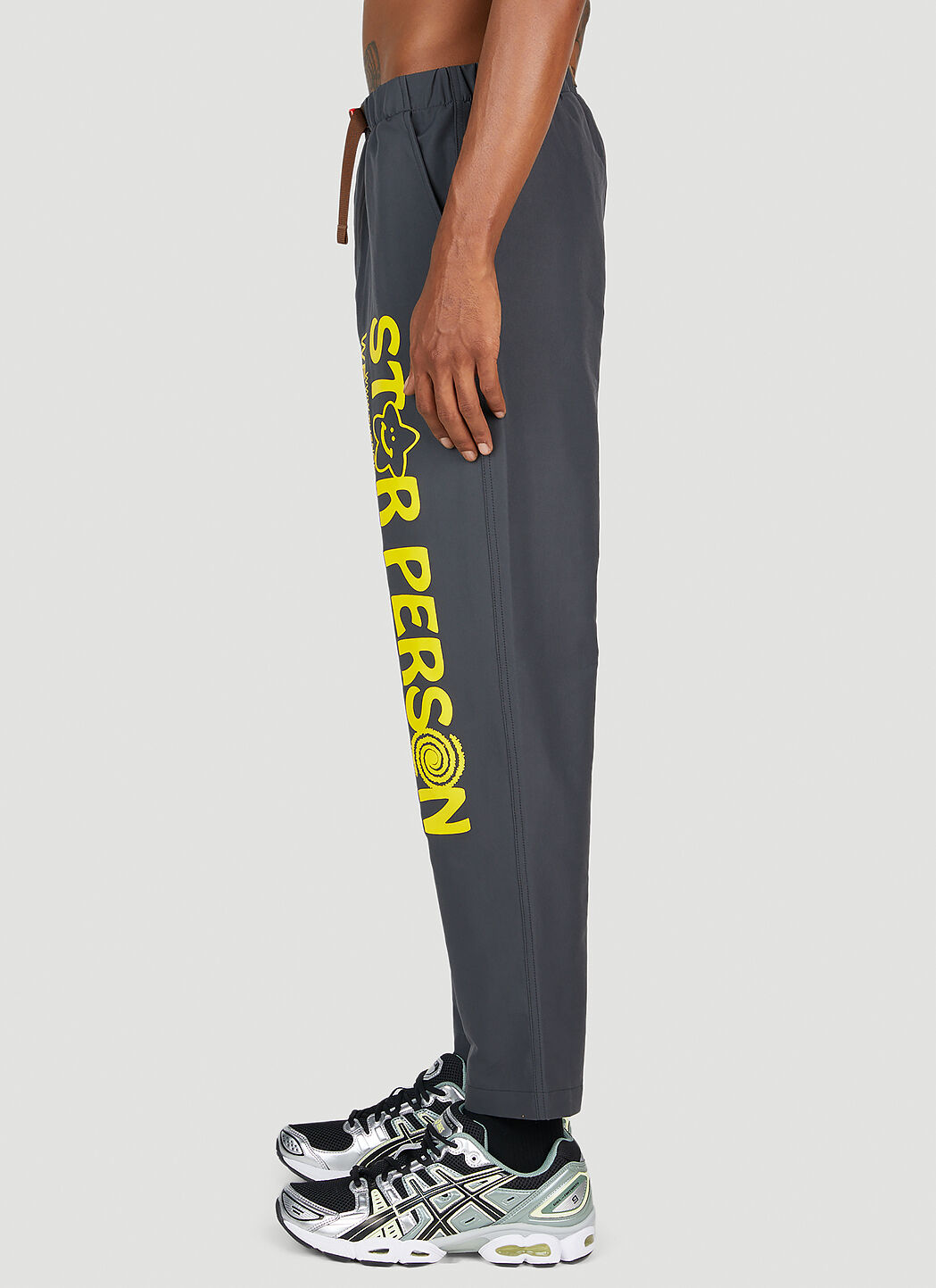 Graphic track pants online
