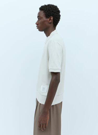 로고 패치가 있는 골지 폴로 셔츠 Thom Browne 로고 패치가 있는 골지 폴로 셔츠 Cream thb0153004