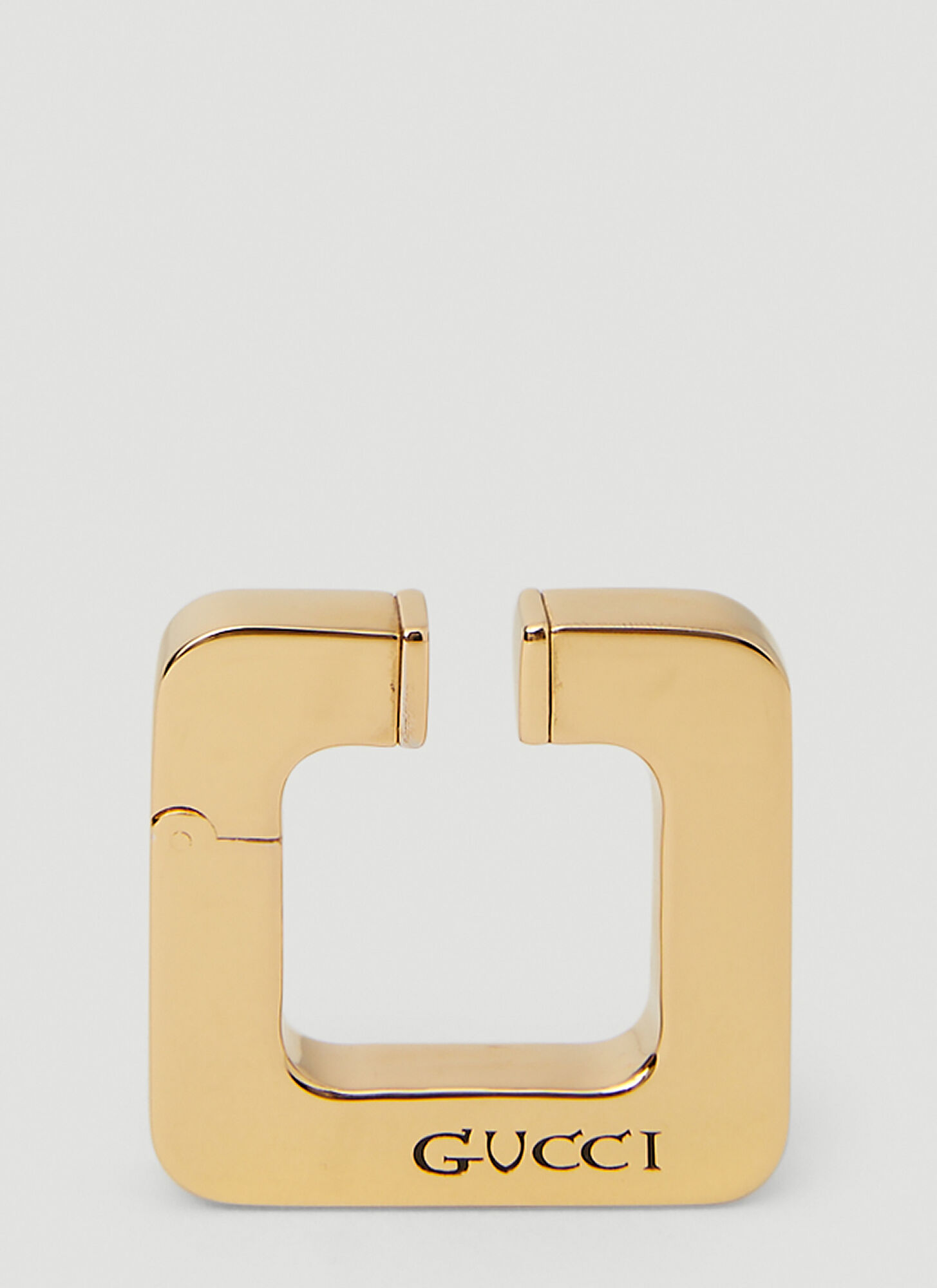 Gucci Logo Engraved Ear Cuff In Gold
