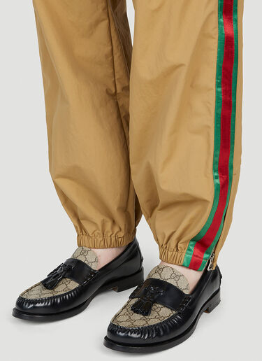 ウェブストライプ トラックパンツ Gucci ウェブストライプ トラックパンツ キャメル guc0153047