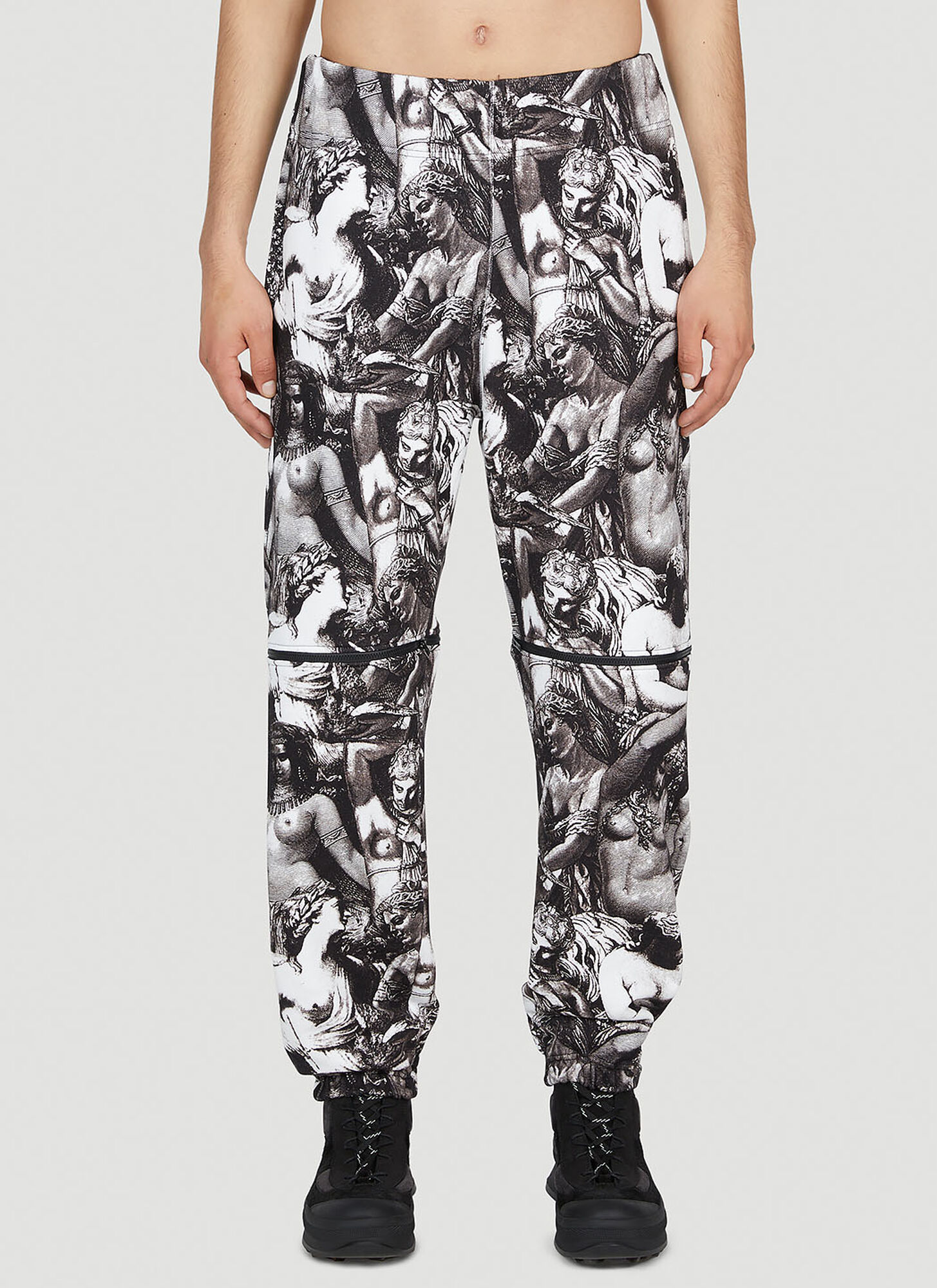Shop Undercover Graphic Print Pants In Black