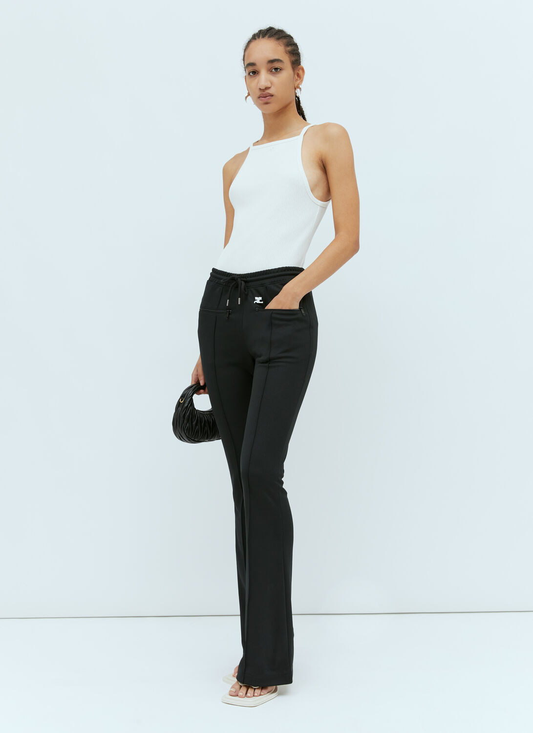 Courrèges Stylish Logo-embellished Flared Trousers For Women In Black