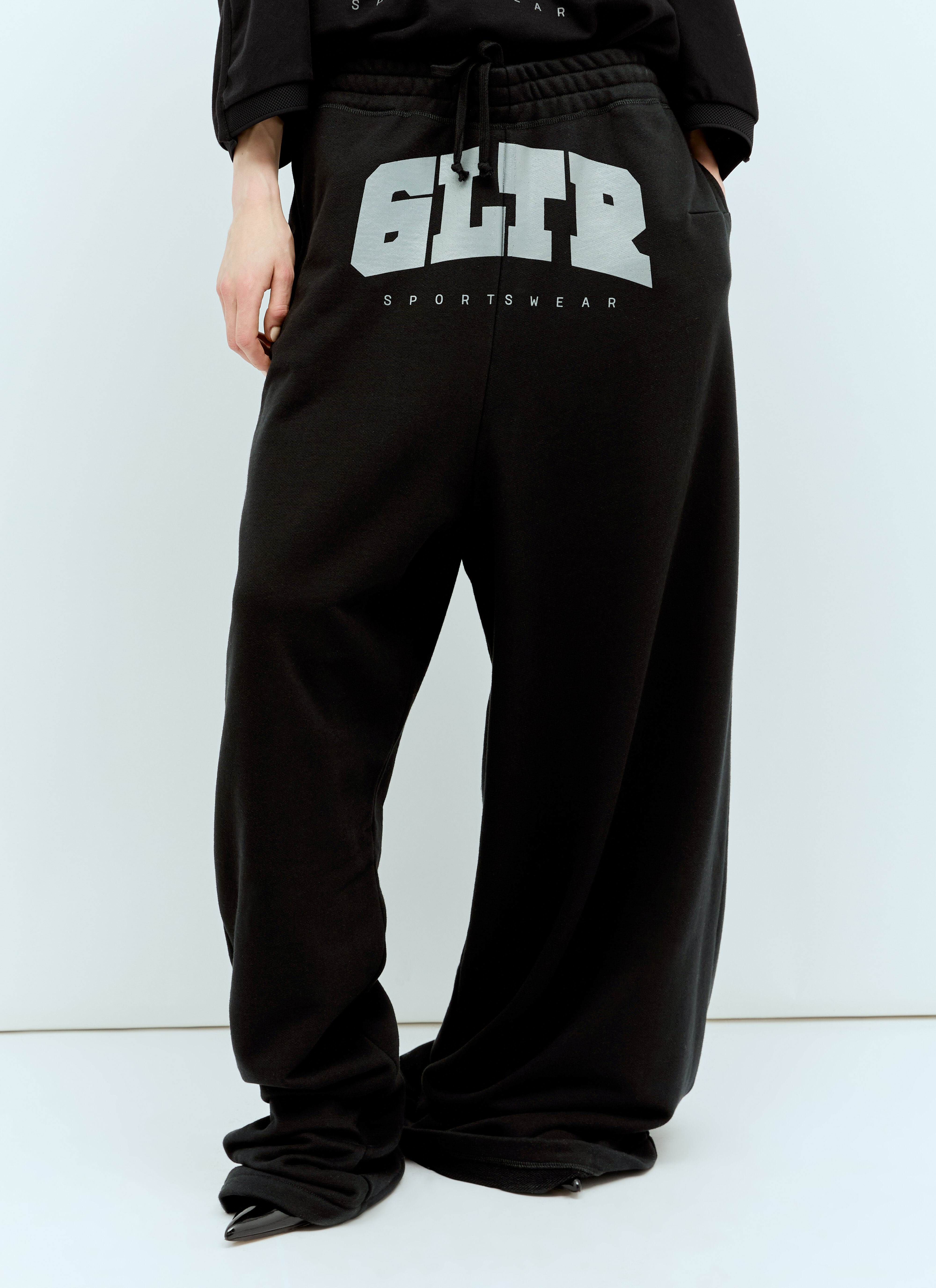 Jean Paul Gaultier x Shayne Oliver GLTR Track Pant Dress en Black