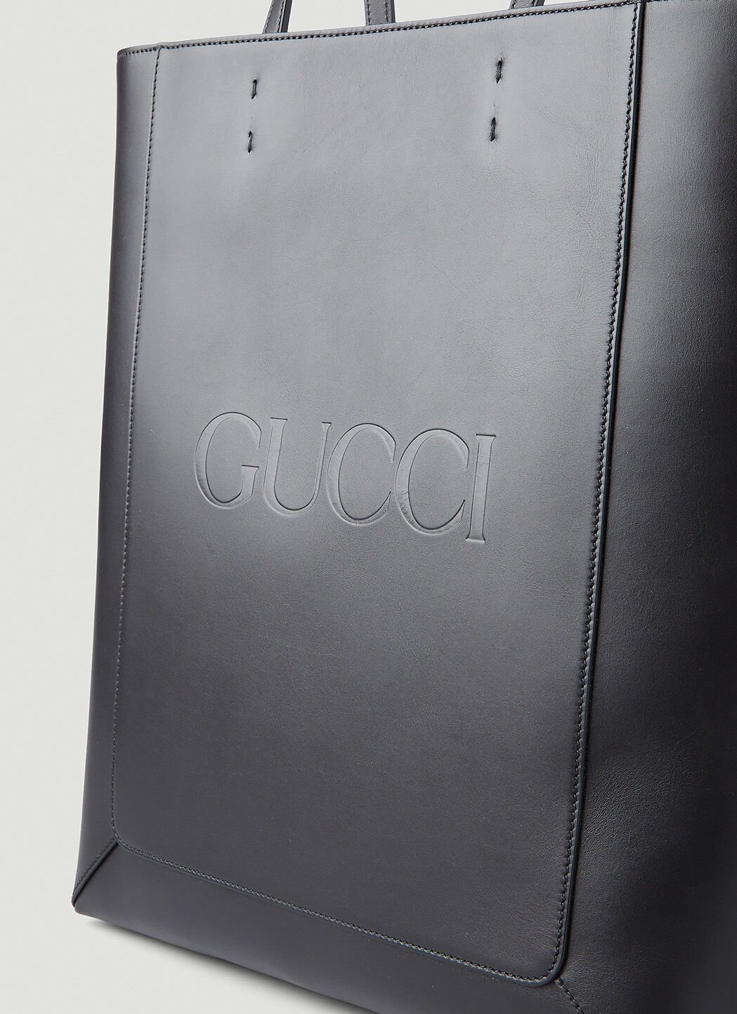 Gucci bag embossed best sale logo