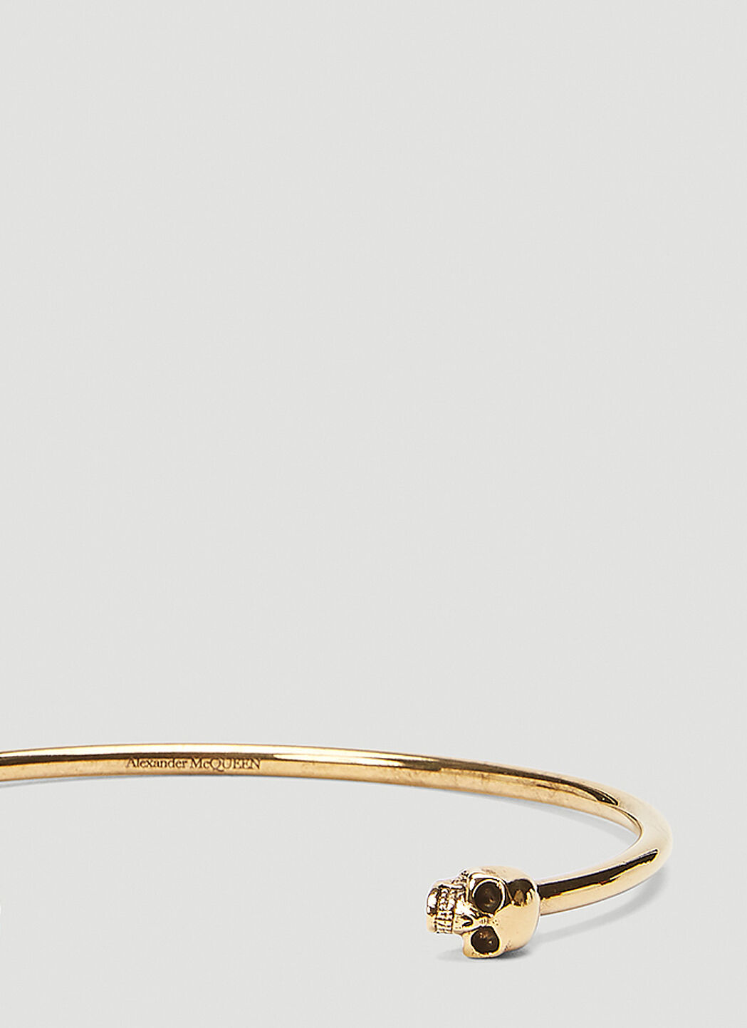 Alexander mcqueen thin discount twin skull bracelet