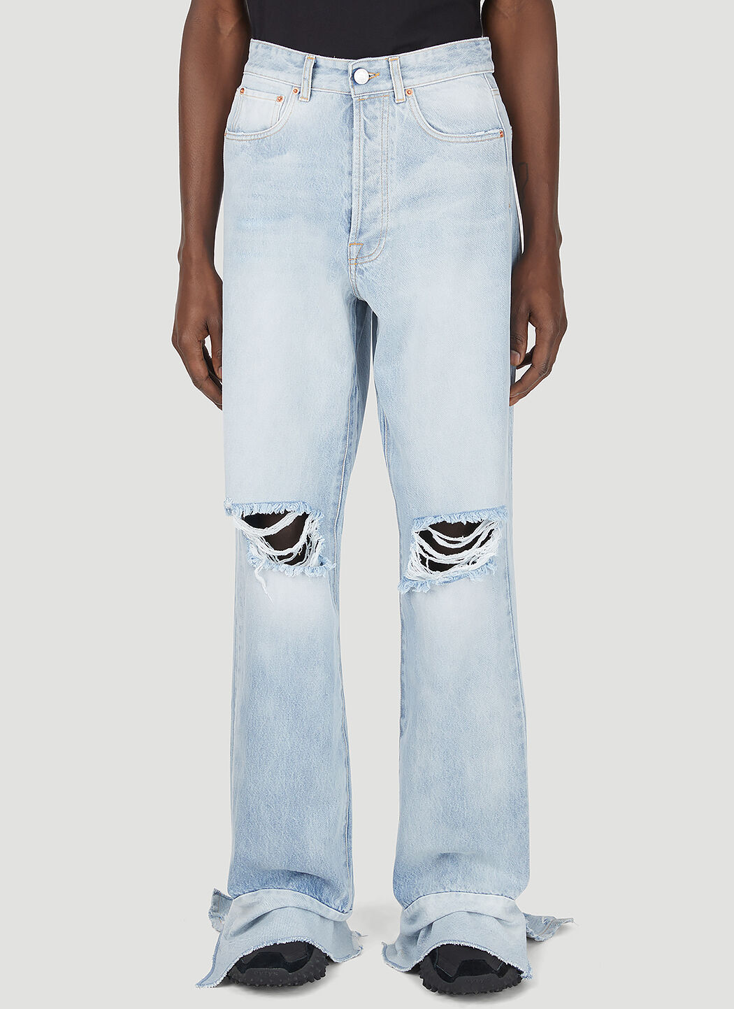 Women cut up 2025 jeans