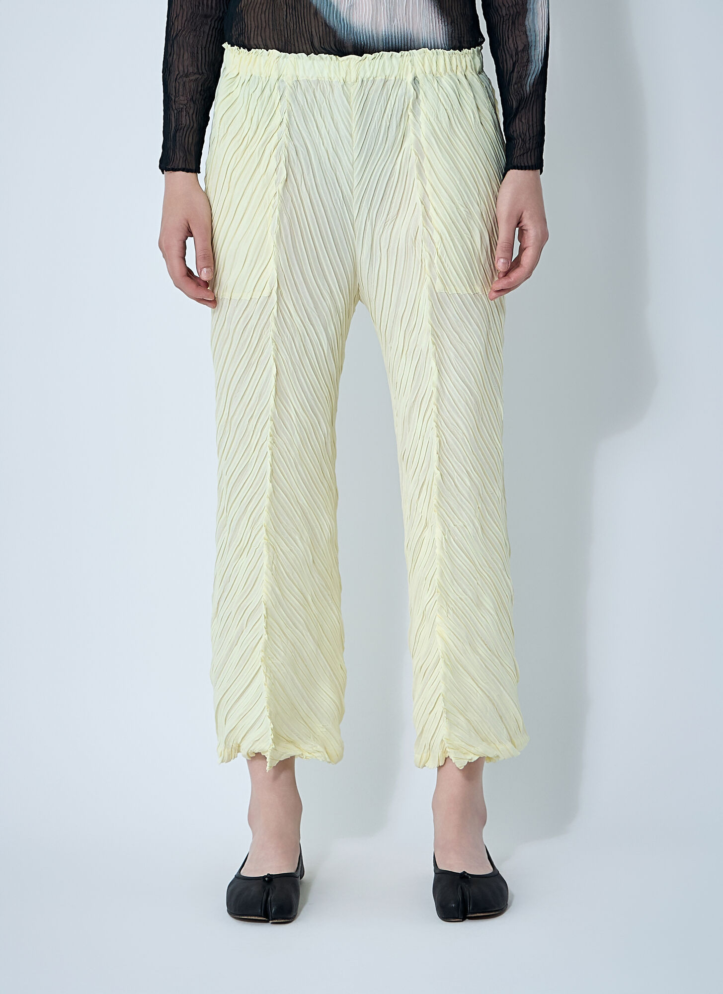 Issey Miyake Women Wrinkled And Twisted Pants In Yellow