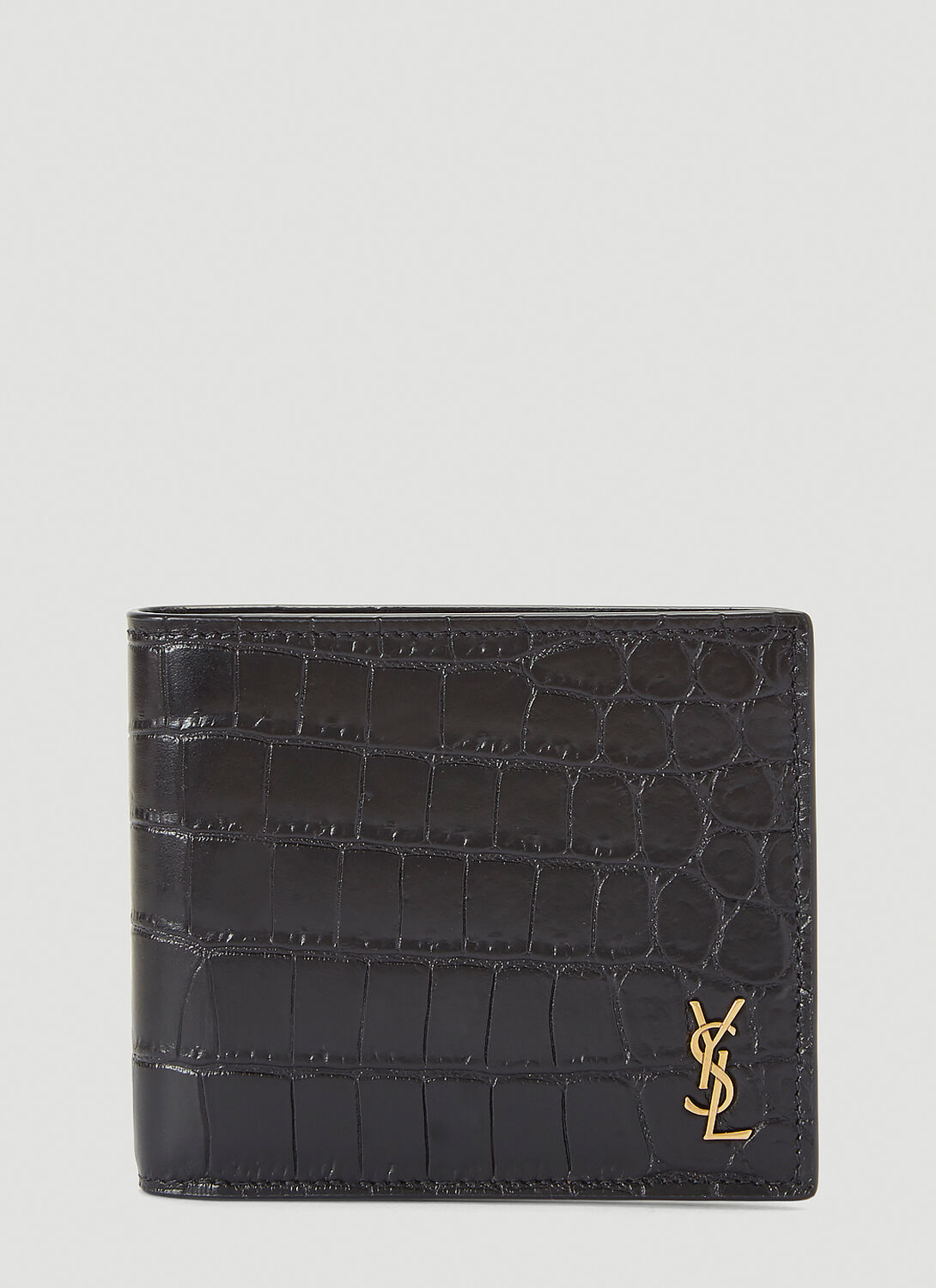 Shop Saint Laurent Crocodile-embossed Bi-fold Wallet In Black