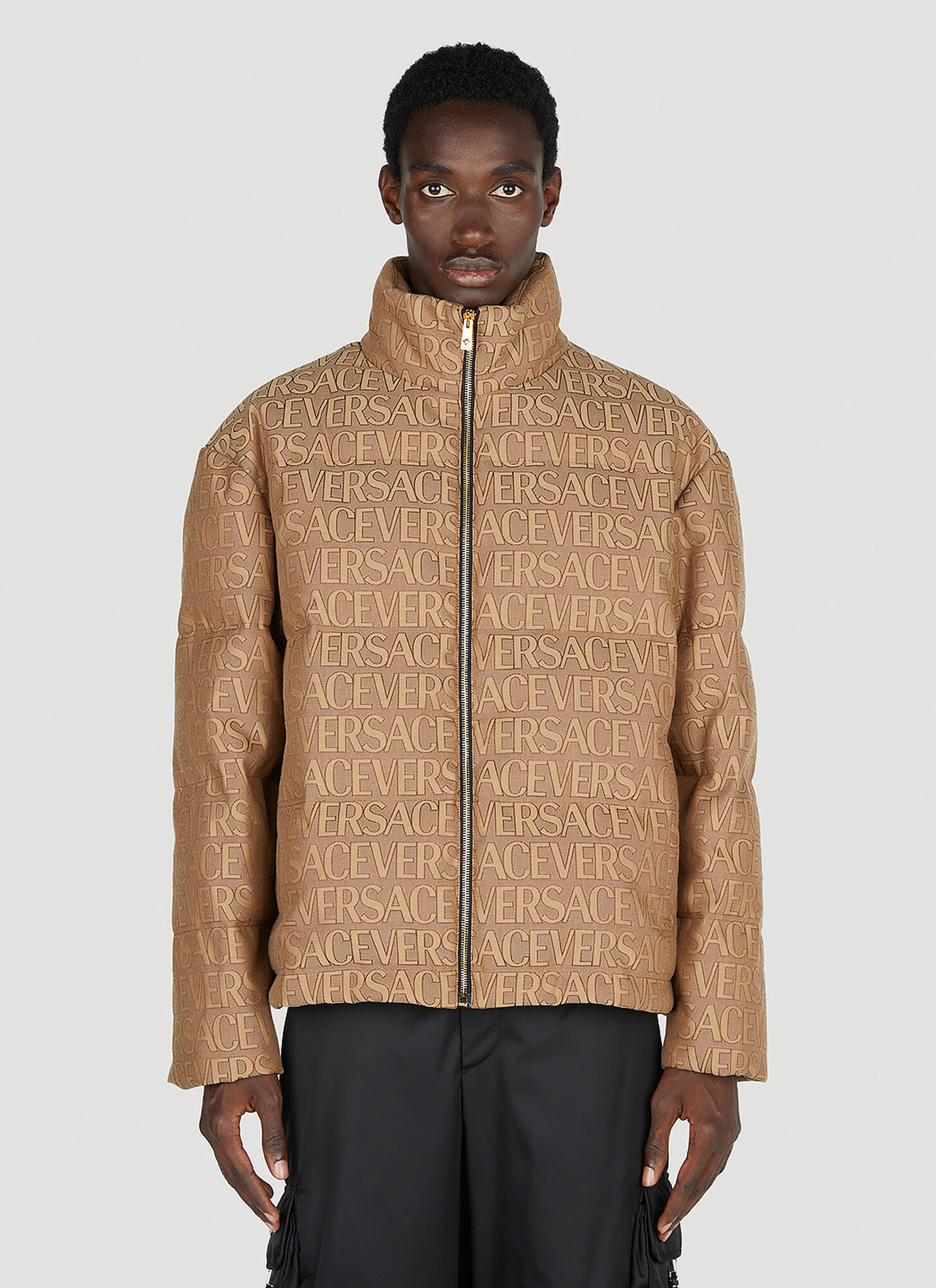 Shop Versace Logo Print Down Jacket In Brown