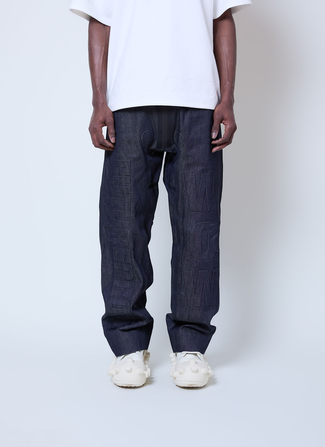 Walter Van Beirendonck Embossed Denim Jeans In Blue