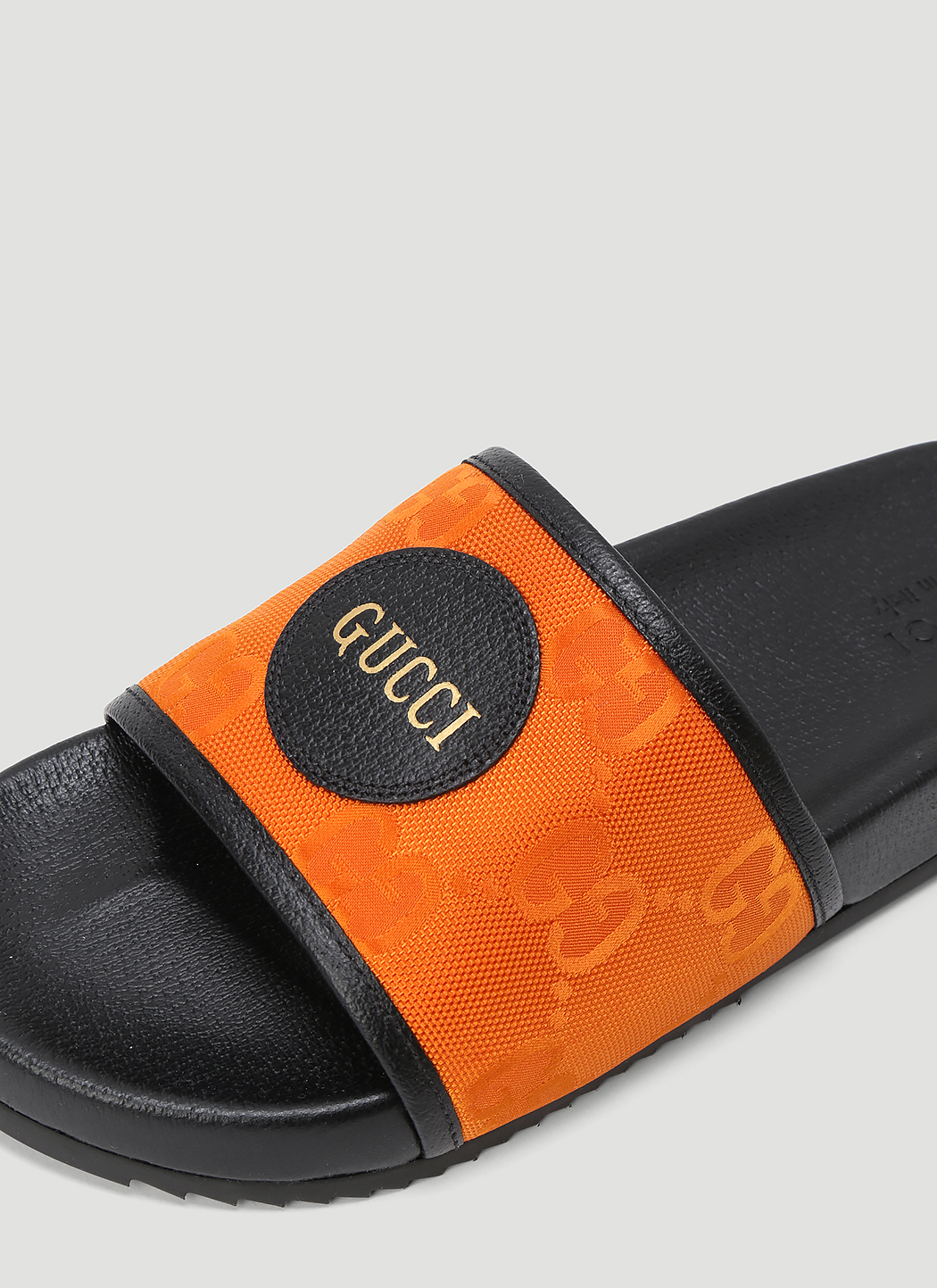 blue and orange gucci slides