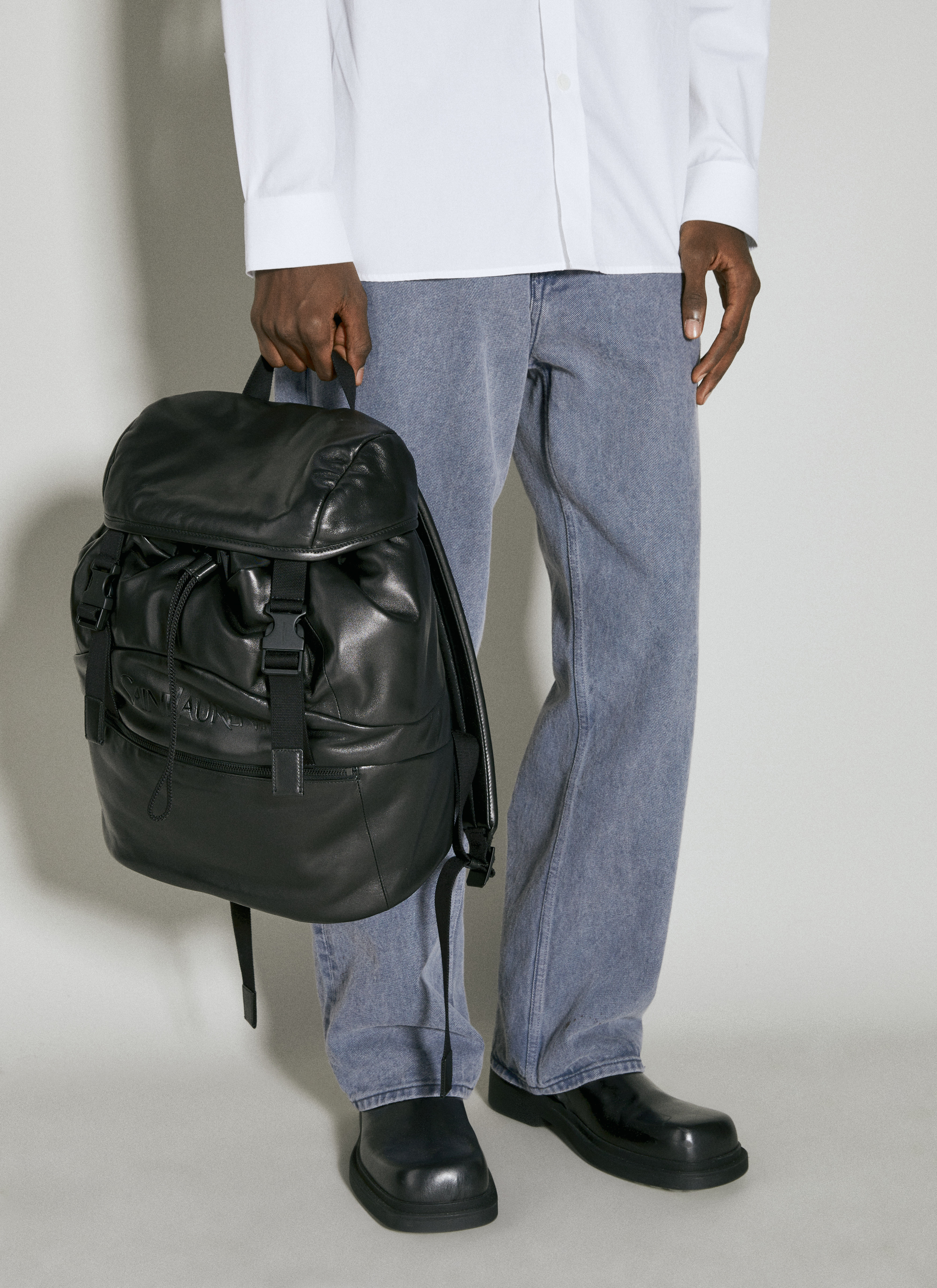 Saint Laurent Men's' Debossed Logo Leather Backpack in Black | LN-CC®