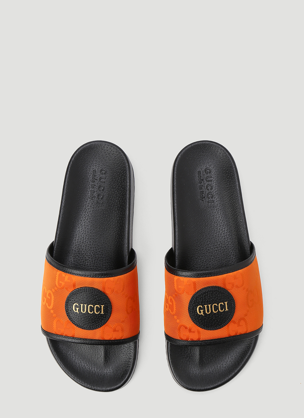 blue and orange gucci slides