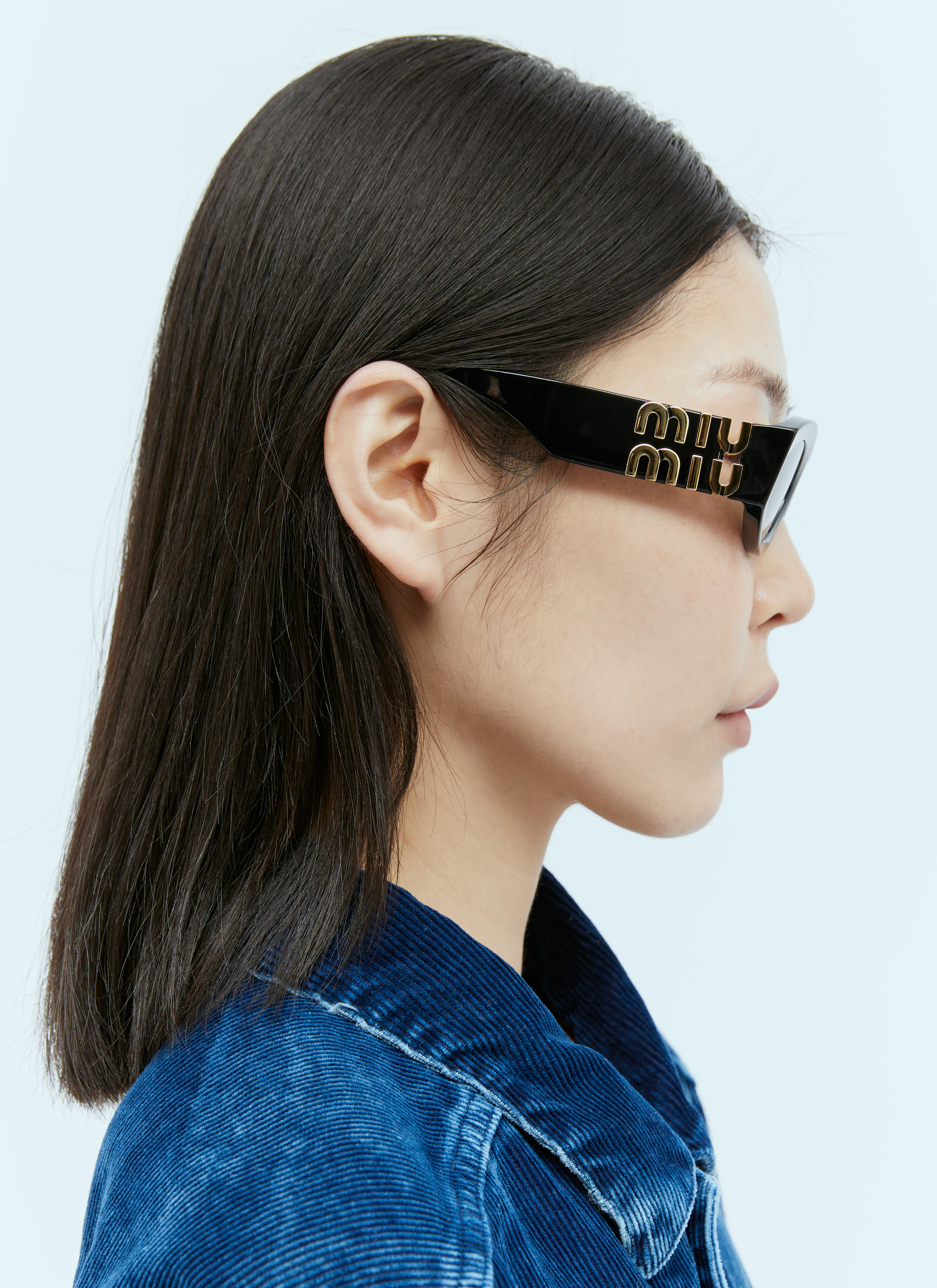 Miu Miu Women's' Oval Sunglasses in Black | LN-CC®