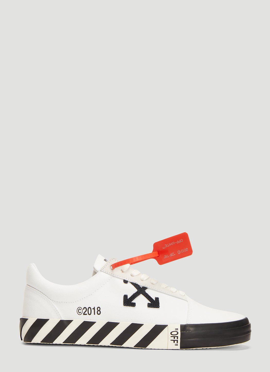 Off-White Vulcanized Low Top Sneakers in White | LN-CC